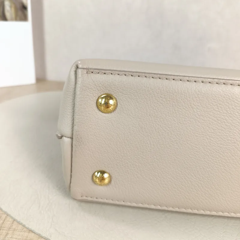 Louis Vuitton Crossbody Bag Lockme Ever Top Handle Bag Calfskin Mini 23 × 10 × 17 cm — detail view 4 of 13