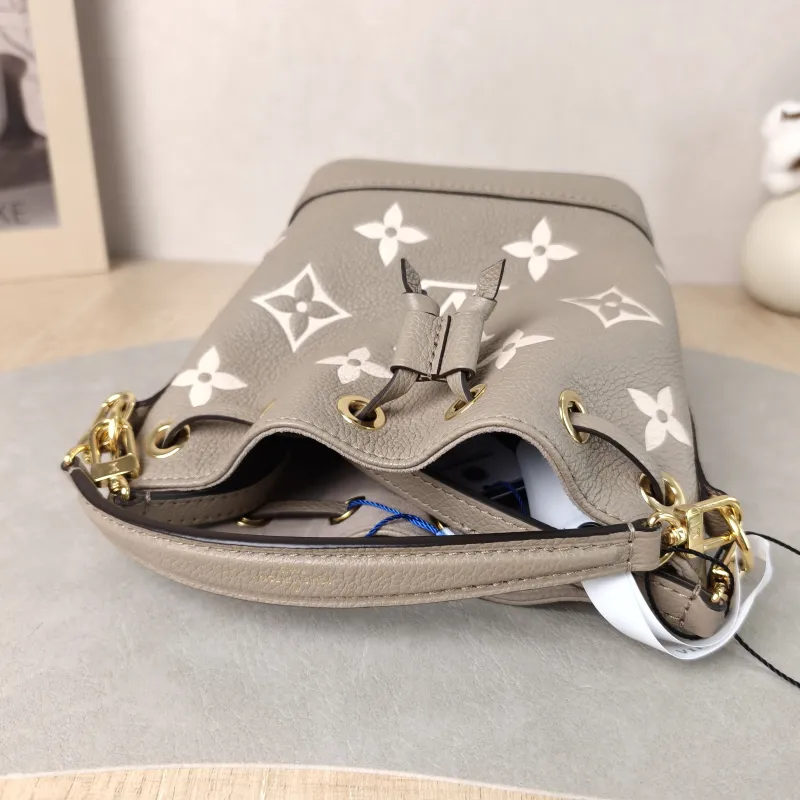 Louis Vuitton Crossbody Bag NANO NOÉ Bucket Bag Nano · White Monogram Empreinte Embossed Calfskin nano 13 × 10 × 16 cm — detail view 4 of 10