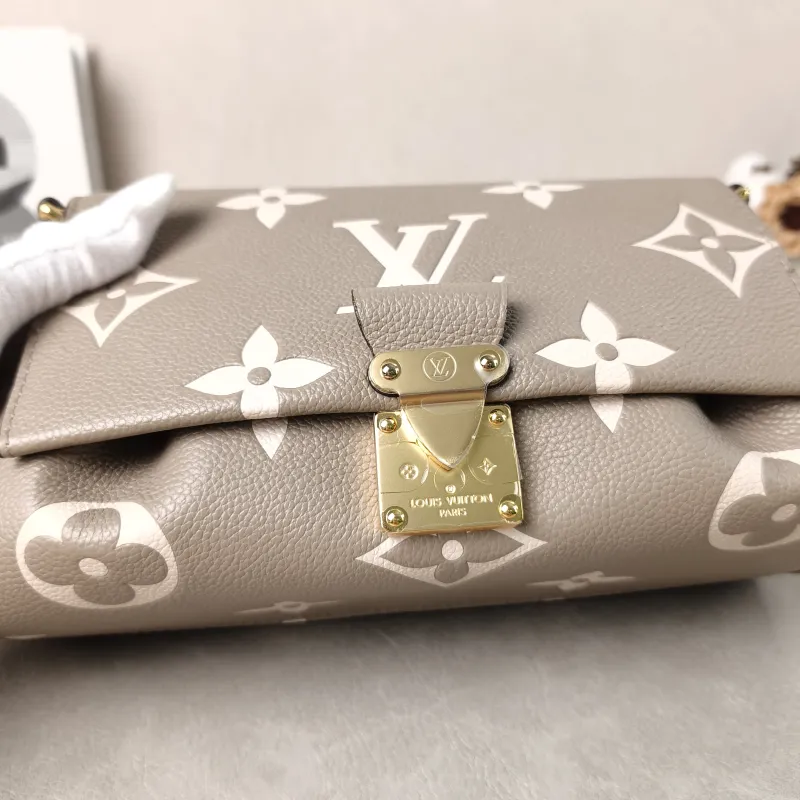 Louis Vuitton Crossbody Bag Favorite Empreinte Embossed Calfskin Medium24 × 9 × 14 cm — detail view 13 of 13