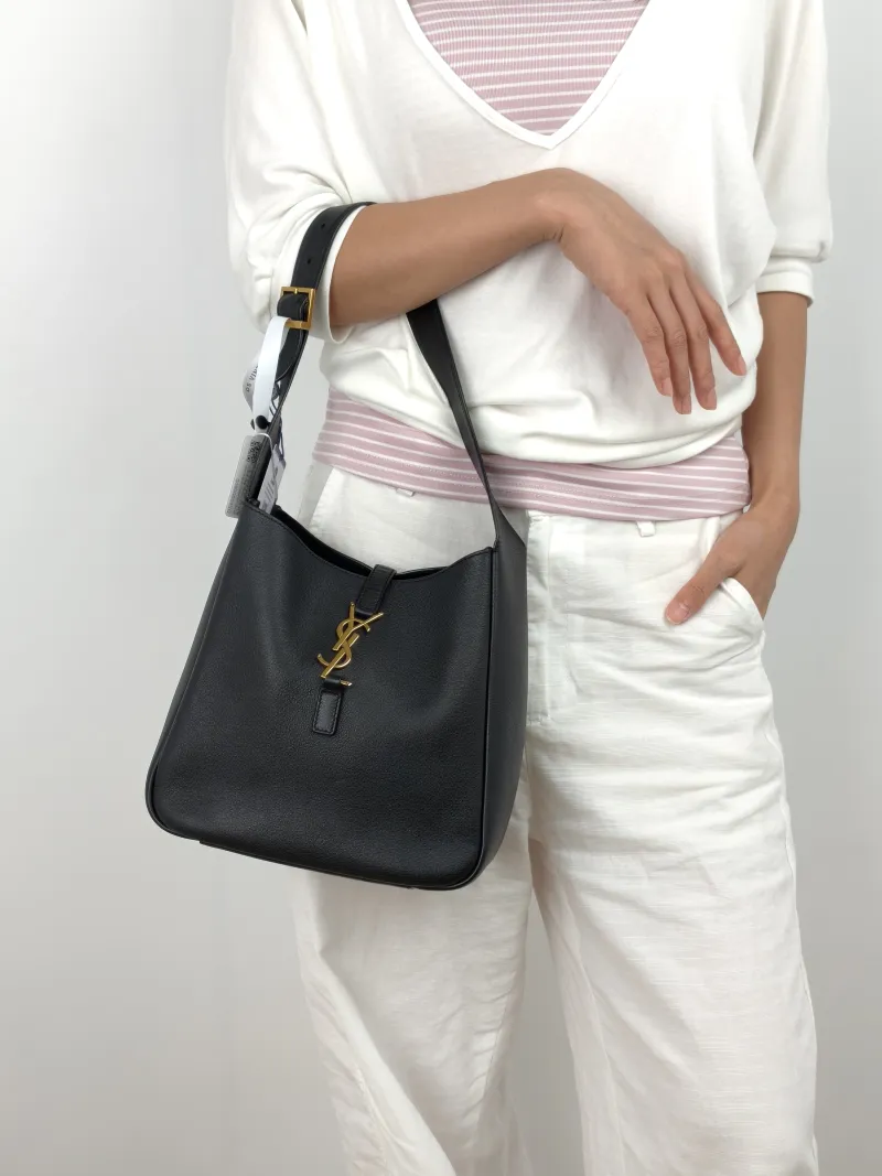 SAINT LAURENT Shoulder Bag LE 5 À 7 Hobo Black Calfskin Small 22 × 8.5 × 23 cm — on-model view 2 of 3
