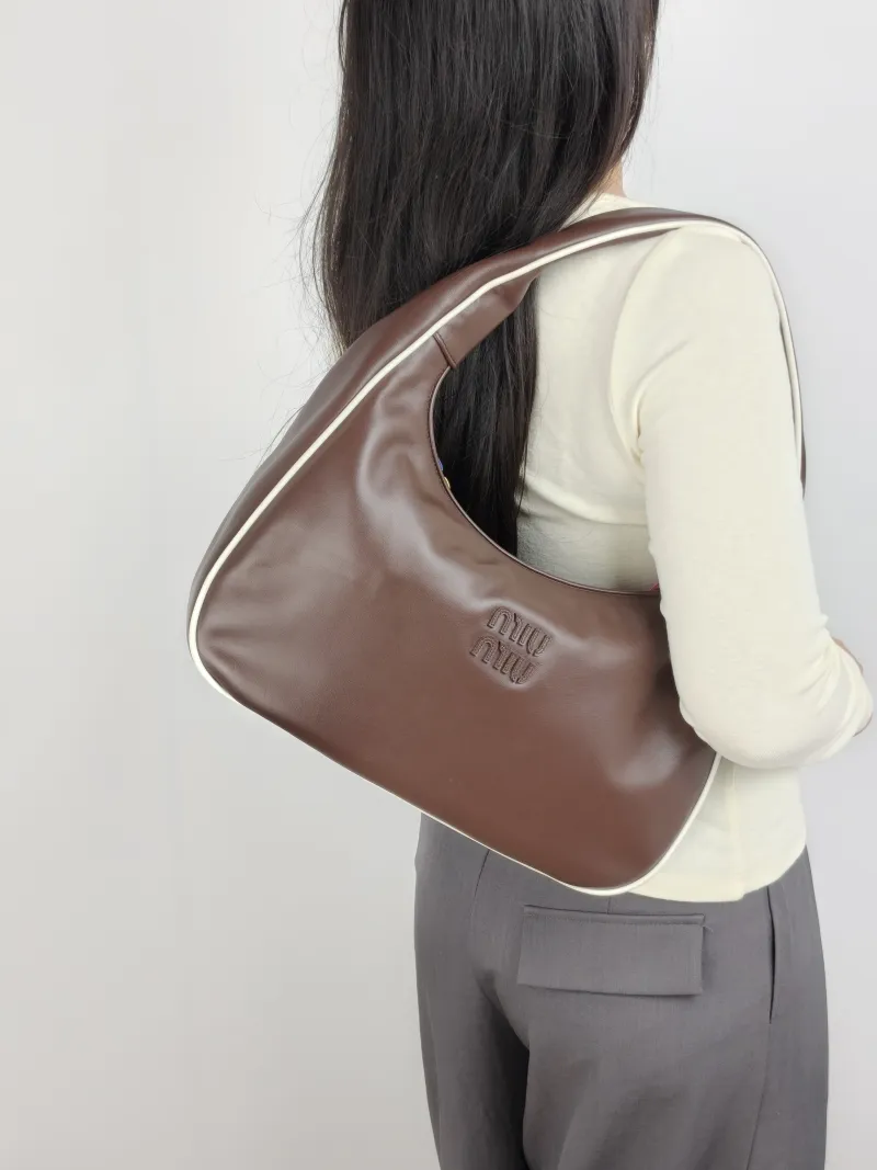 Miumiu Shoulder Bag Wander Collectionhobo Shoulder Bag Calfskin One Size 35 × 10 × 20 cm — on-model view 1 of 2