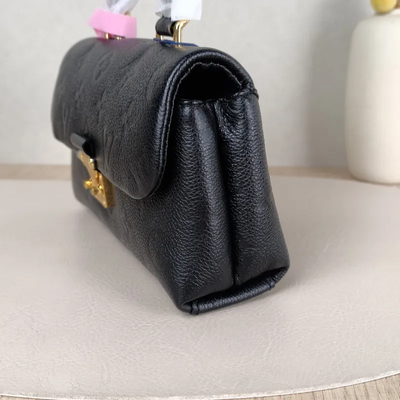 Louis Vuitton Crossbody Bag MADELEINE Black Monogram Empreinte Embossed Calfskin nano 21 × 6 × 12.5 cm — detail view 9 of 11