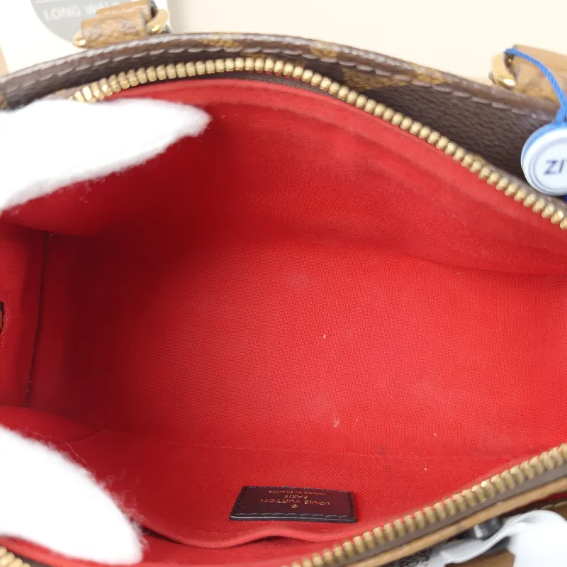 Louis Vuitton Crossbody Bag Onthego East West Monogram PVC Small 25 × 10 × 13 cm — detail view 2 of 11