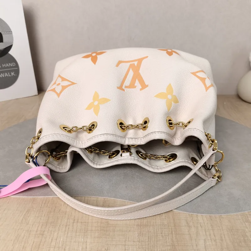 Louis Vuitton Crossbody Bag BUNDLE Beige Empreinte Embossed Calfskin Medium 28 × 11.5 × 20 cm — detail view 13 of 14