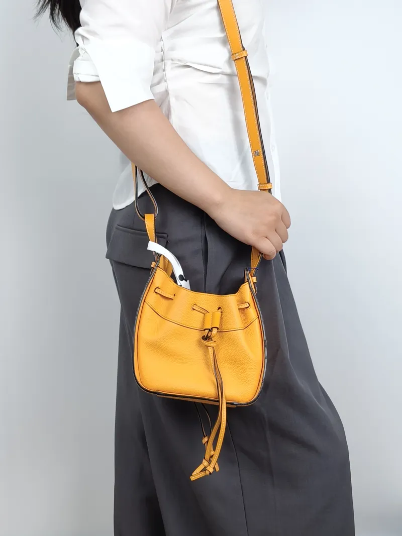 LOEWE Crossbody Bag Hammock Calfskinmini17 × 11 × 19.5 cm — on-model view 1 of 3