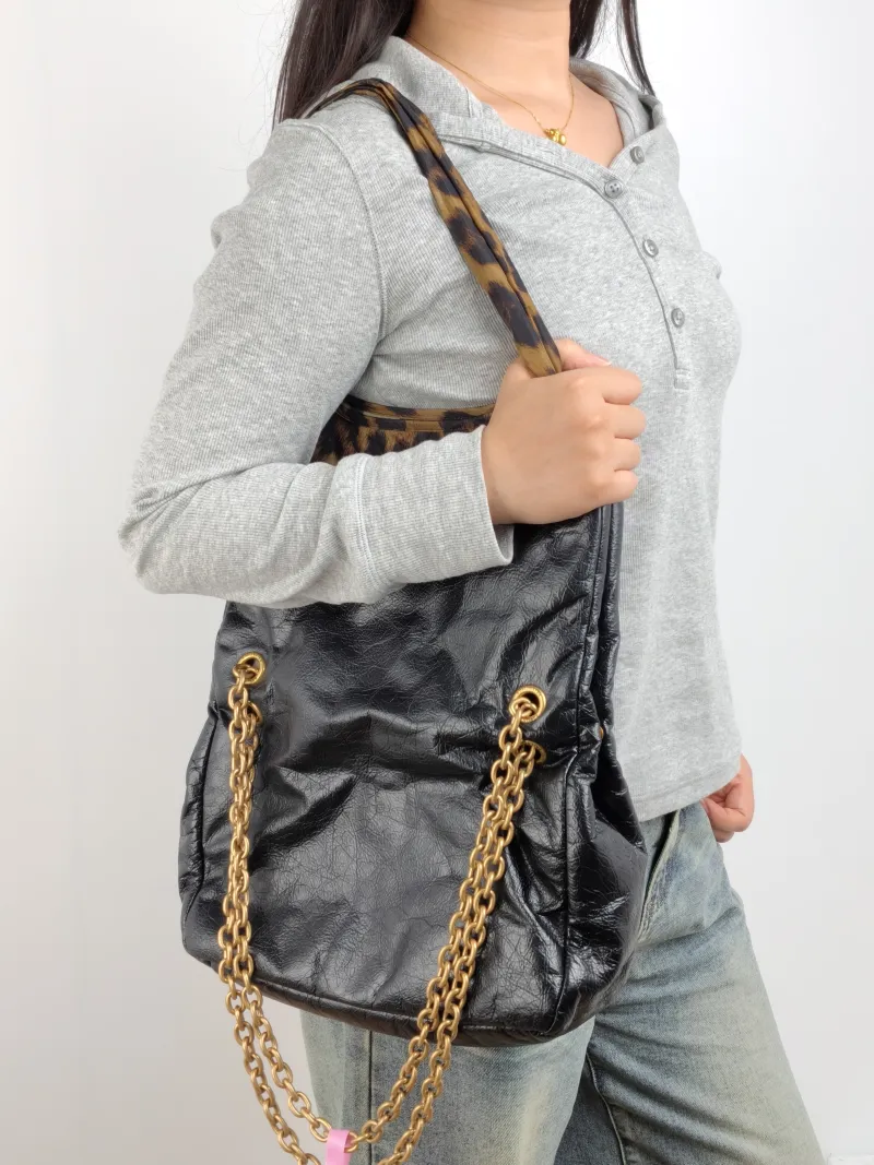 BALENCIAGA Shoulder Bag MONACO PLUS Black Calfskin Small 28 × 9 × 19 cm — on-model view 3 of 3