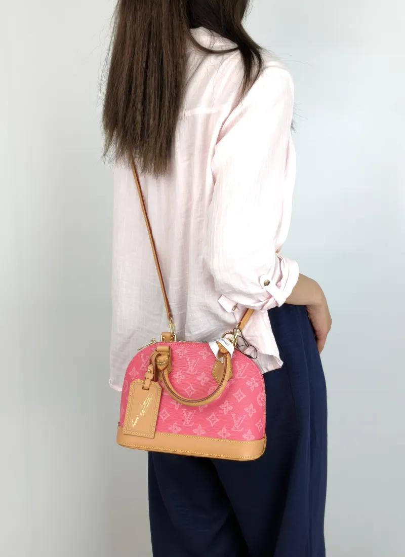 Louis Vuitton Top Handle Bag Alma BB Pink PVCBB23.5 × 11.5 × 17.5 cm — on-model view 3 of 3