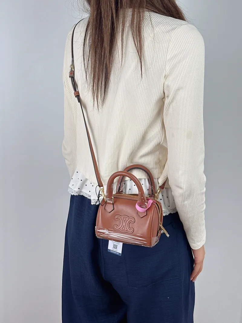 CELINE Crossbody Bag Calfskin Mini 14 × 7.5 × 9.5 cm — on-model view 1 of 2
