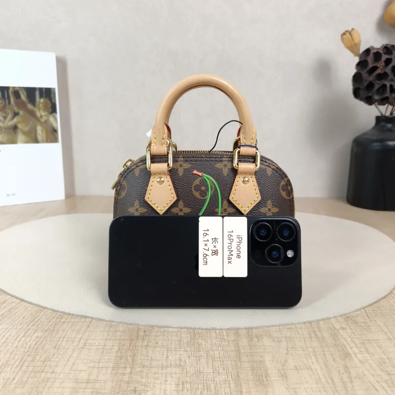 Louis Vuitton Crossbody Bag Alma Nano Monogram · PV Cnano18 × 8 × 12 cm — cover view 6 of 6