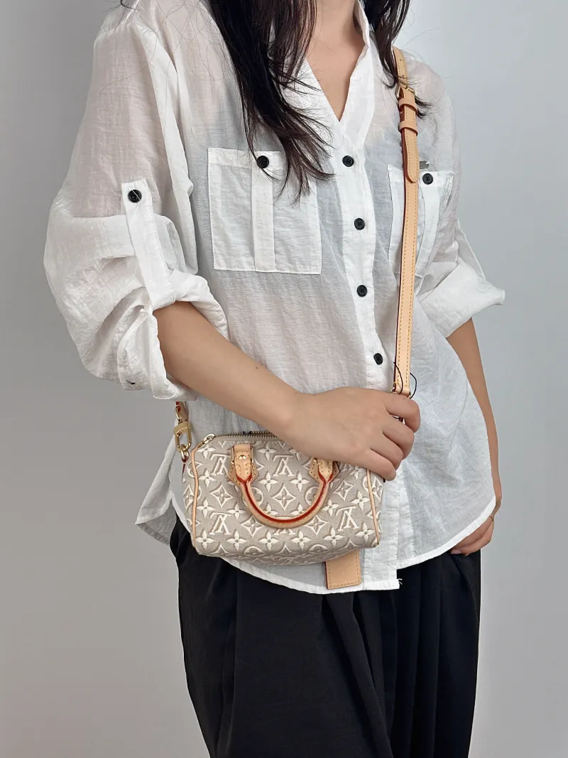 Louis Vuitton Crossbody Bag Speedy Nano Beige nano 16 × 7.5 × 10 cm — on-model view 1 of 2