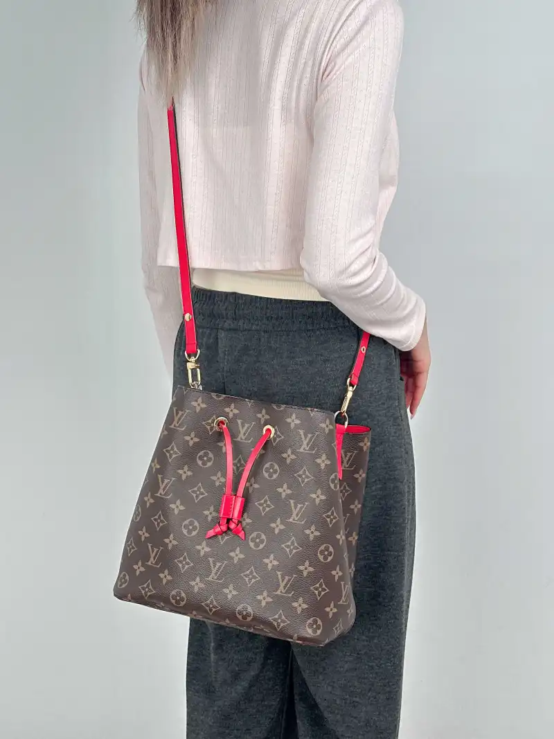 Louis Vuitton Shoulder Bag NÉONOÉ Bucket Bag PVC Medium 26 × 17.5 × 26 cm — on-model view 2 of 2