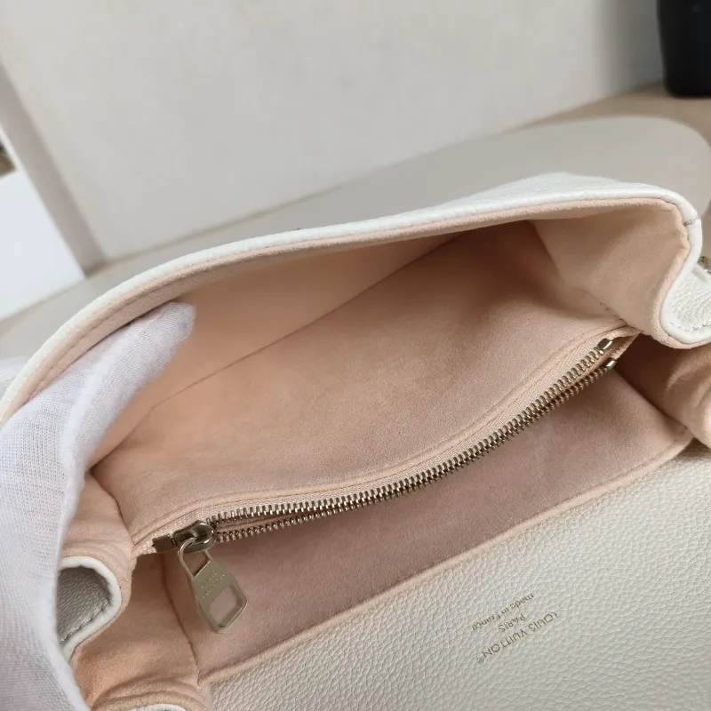 Louis Vuitton Crossbody Bag Pochette Métis East West White · Pink Monogram Empreinte Embossed Calfskin Small 21.5 × 6 × 13.5 cm — detail view 9 of 13
