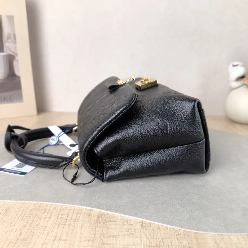 Louis Vuitton Crossbody Bag MADELEINE Black Empreinte Embossed Calfskin BB 24 × 8.5 × 17 cm — detail view 8 of 12