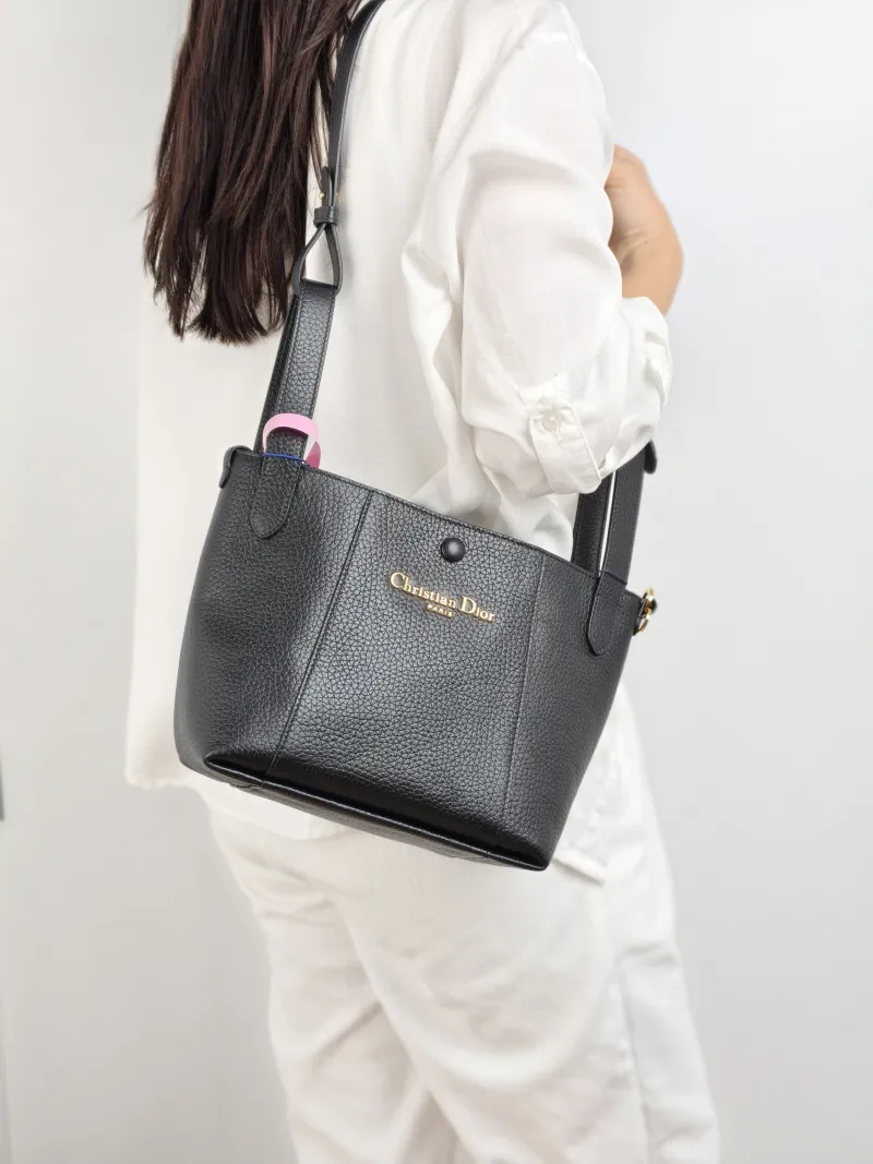 DIOR Top Handle Bag Signature Bucket Bag Black Calfskin Small 21 × 11 × 19 cm — on-model view 1 of 2