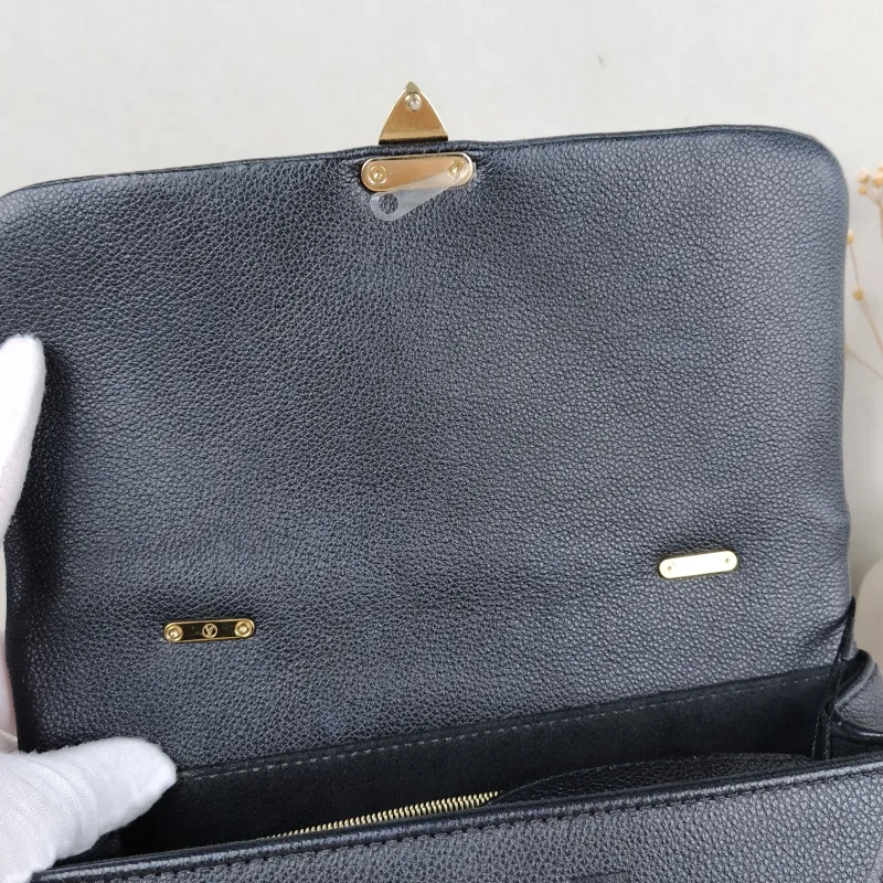 Louis Vuitton Crossbody Bag MADELEINE Black Monogram Empreinte Embossed Calfskin Medium 30 × 11 × 19.5 cm — detail view 6 of 13