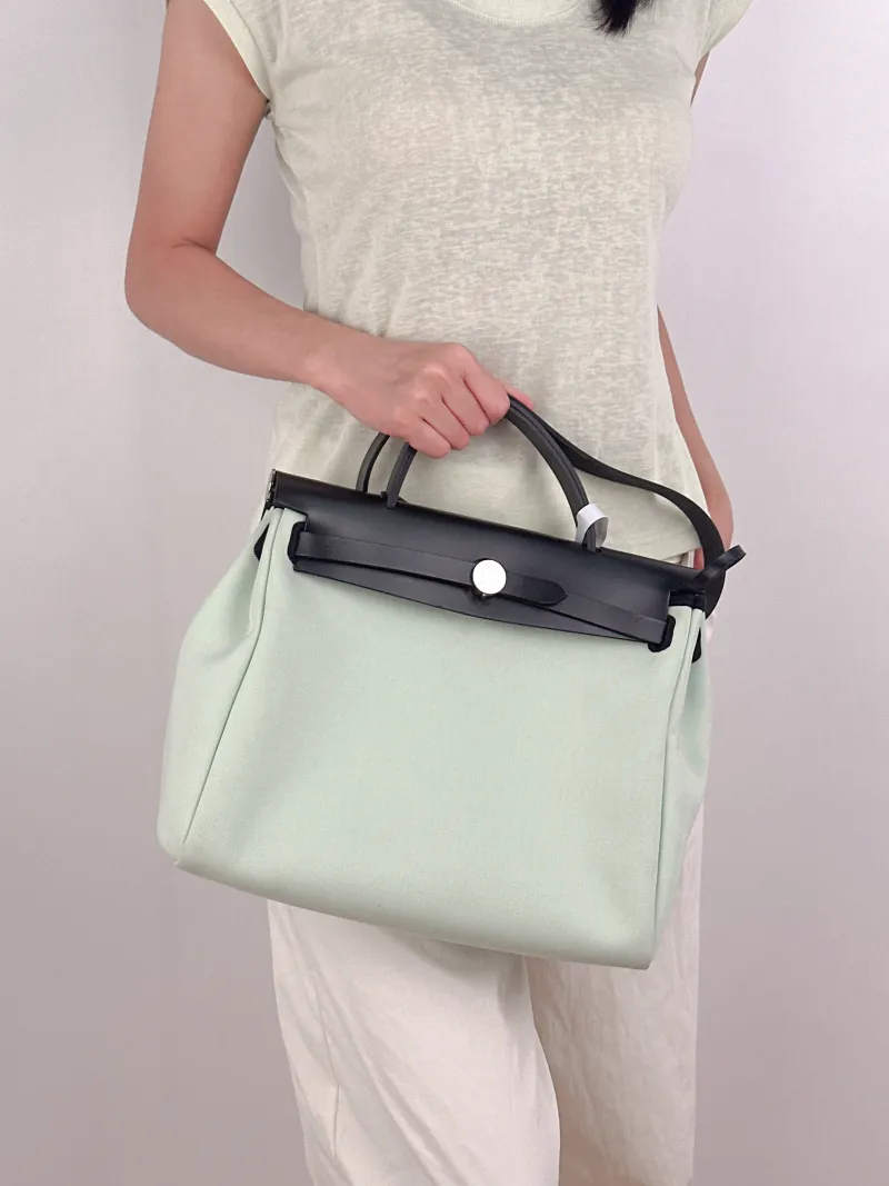 Hermès Shoulder Bag Herbag 31 Green Canvas Medium31 × 10 × 25 cm — on-model view 3 of 3