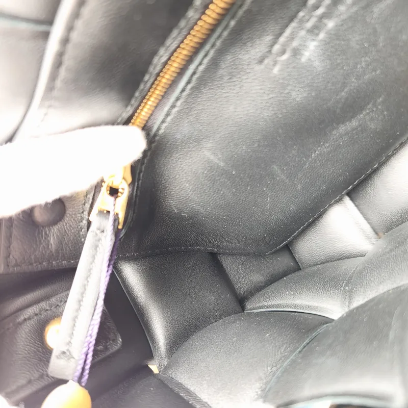 Bottega Veneta Crossbody Bag Padded Cassette Woven Black Lambskin Medium 26 × 8 × 18 cm — detail view 11 of 12