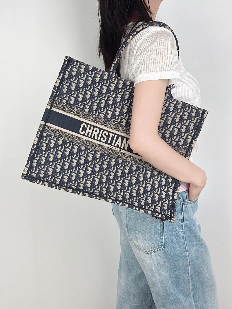 DIOR Top Handle Bag Book Tote Blue Canvas Large42 × 18.5 × 35 cm — on-model view 2 of 2