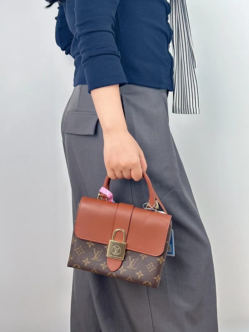 Louis Vuitton Crossbody Bag Locky BB Caramel PVC BB 20 × 7.5 × 16 cm — on-model view 2 of 2