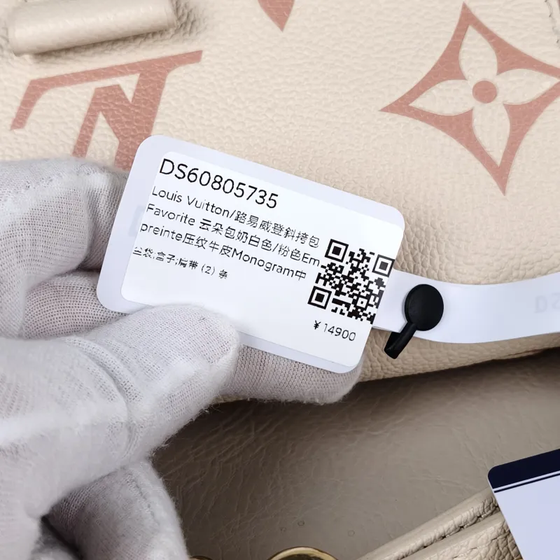 Louis Vuitton Crossbody Bag Favorite White · Pink Empreinte Embossed Calfskin Monogram Medium24 × 9 × 14 cm — detail view 6 of 14