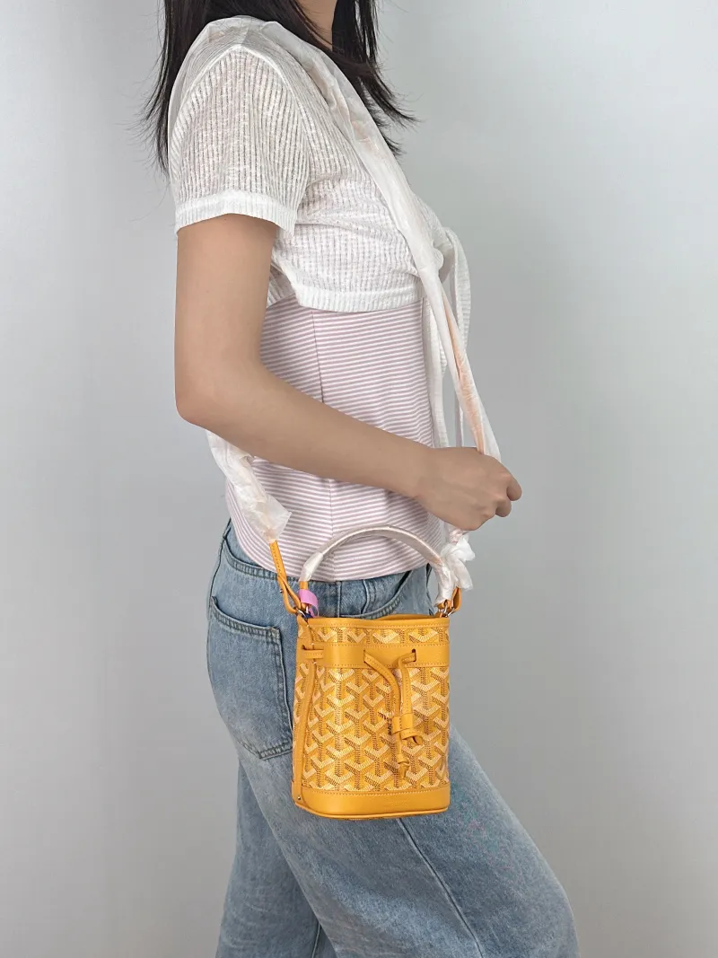 GOYARD Crossbody Bag Petit Flot Yellow ine Canvas Mini 12 × 10 × 17.5 cm — on-model view 2 of 3