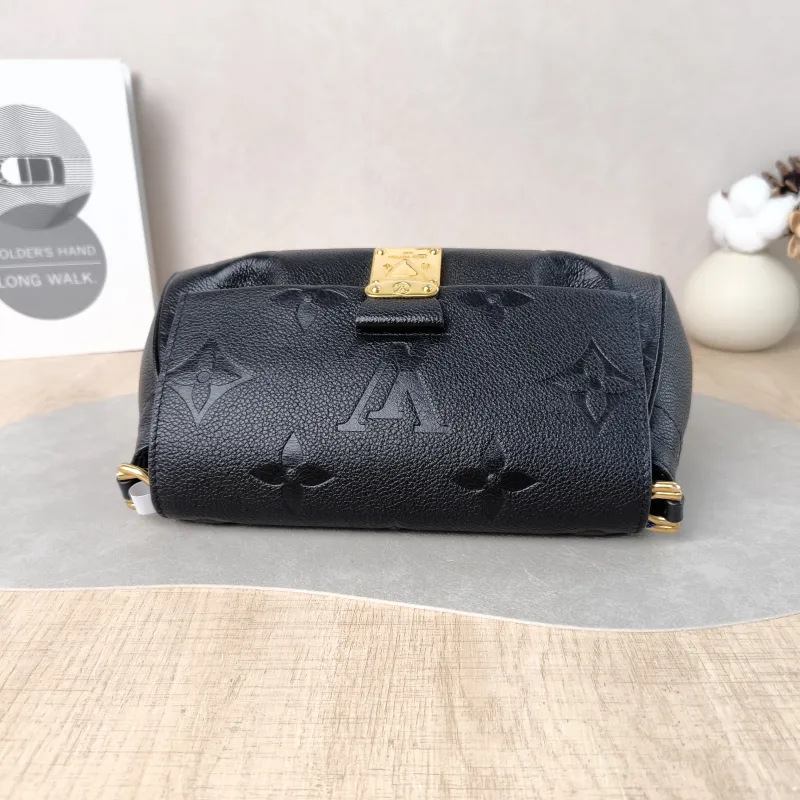 Louis Vuitton Crossbody Bag Favorite Black Monogram Empreinte Embossed Calfskin Medium 24 × 9 × 14 cm — detail view 7 of 12