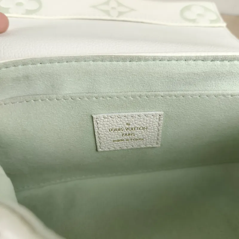 Louis Vuitton Crossbody Bag Favorite White · Green Empreinte Embossed Calfskin Monogram Medium24 × 9 × 14 cm — detail view 1 of 10