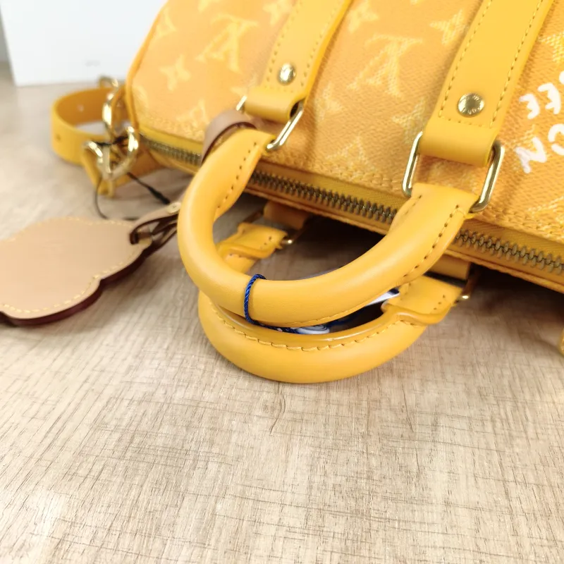 Louis Vuitton Crossbody Bag Keepall 25 Collection Yellow PVC Medium 25 × 11 × 15 cm — detail view 1 of 12