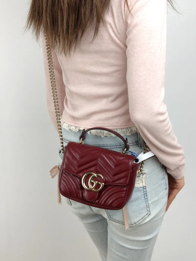 GUCCI Crossbody Bag GG Marmont Marmont Edition Calfskin Mini 17 × 6 × 13 cm — on-model view 1 of 2