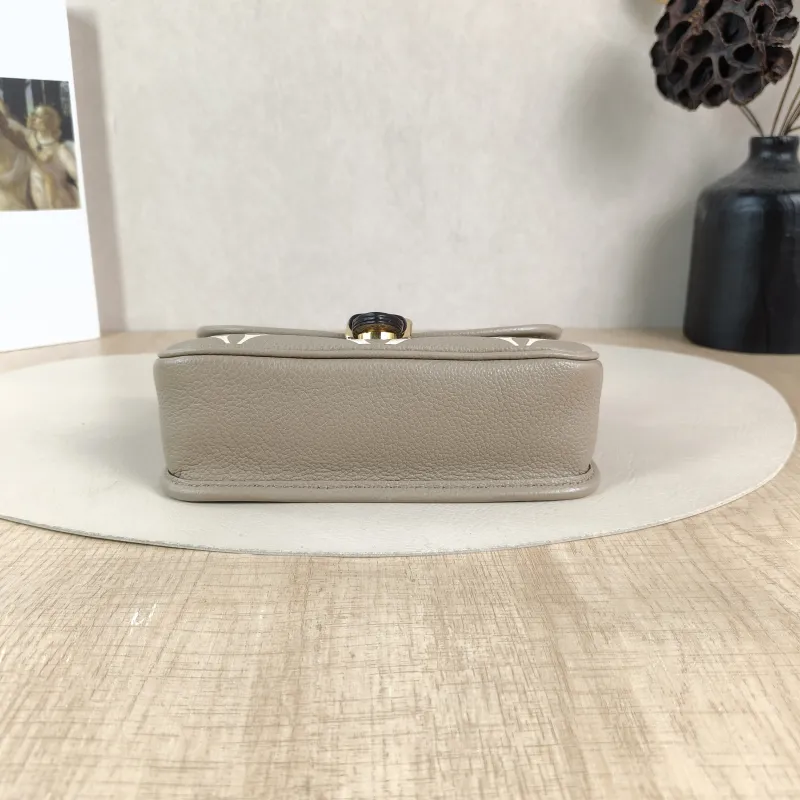 Louis Vuitton Crossbody Bag Diane Baguette Bag Empreinte Embossed Calfskin nano 19 × 6 × 10.5 cm — cover view 5 of 5
