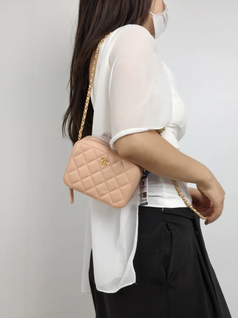 Chanel Crossbody Bag Camera Bag Pink Lambskin One Size 14.5 × 6 × 10.5 cm 31 — on-model view 1 of 2