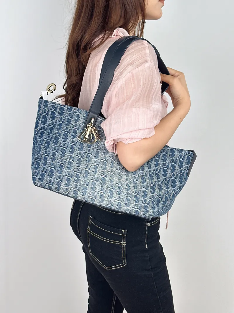 DIOR Top Handle Bag TOUJOURS Blue Medium28.5 × 17 × 21.5 cm — on-model view 1 of 2