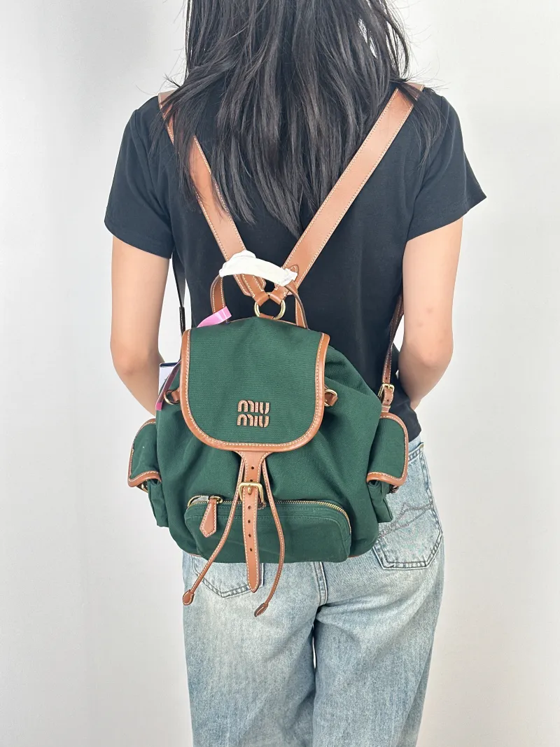 Miumiu Backpack Backpack Green Canvas Large25 × 12.5 × 29.5 cm — on-model view 3 of 3