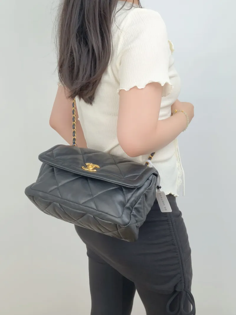 Chanel Crossbody Bag C Black Lambskin Small 28 × 9.5 × 17 cm — on-model view 3 of 3