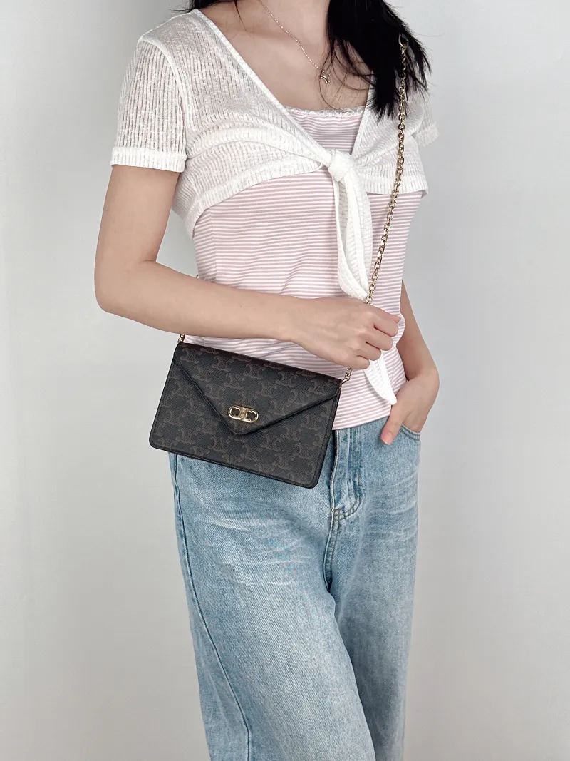 CELINE Crossbody Bagmallon triomphe woc Monogram PV Cmini19.5 × 4 × 13 cm — on-model view 2 of 3