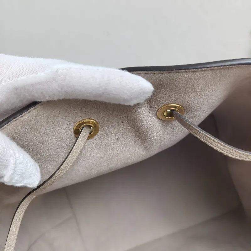 Louis Vuitton Shoulder Bag NÉONOÉ Bucket Bag · White Monogram Empreinte Embossed Calfskin Medium 26 × 17.5 × 26 cm — detail view 7 of 13