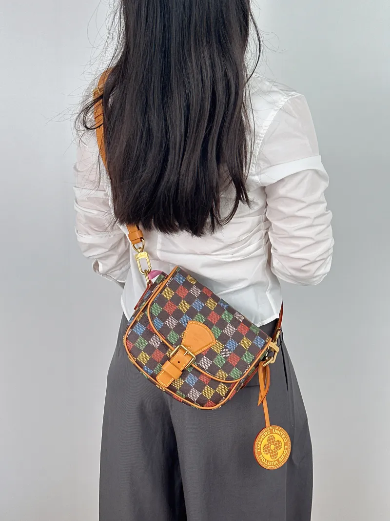 Louis Vuitton Crossbody Bag MONTSOURIS Messenger Bag Brown PVC Small 20 × 7 × 17 cm — on-model view 2 of 2