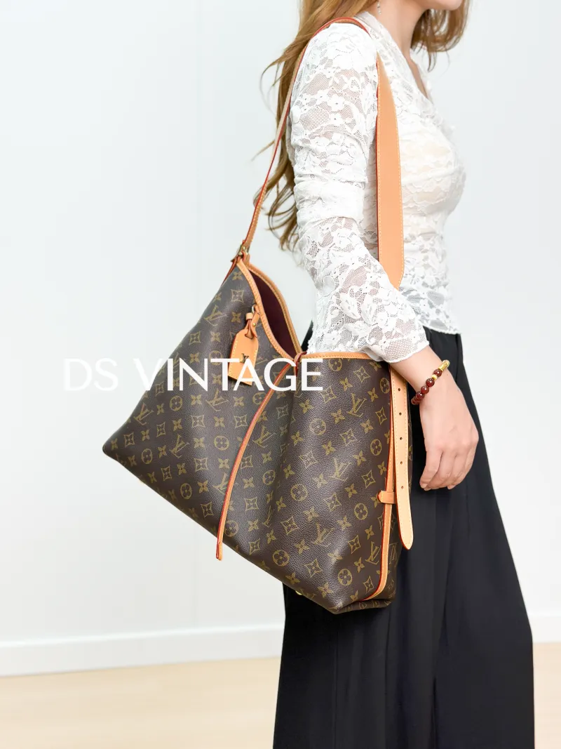 Louis Vuitton Crossbody Bag Carryall Monogram PVC Medium 39 × 15 × 30 cm — on-model view 6 of 6