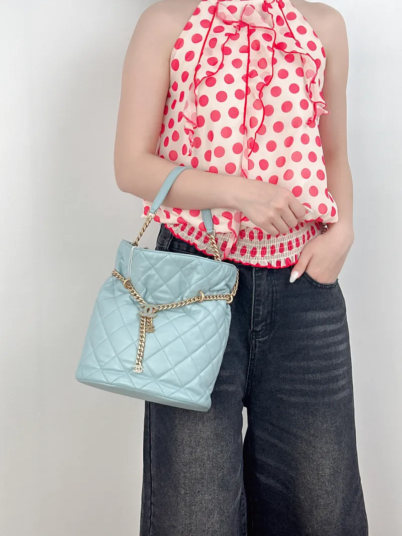 Chanel Crossbody Bag Bucket Bag Blue Calfskin One Size22 × 4 × 25 cm — on-model view 1 of 3