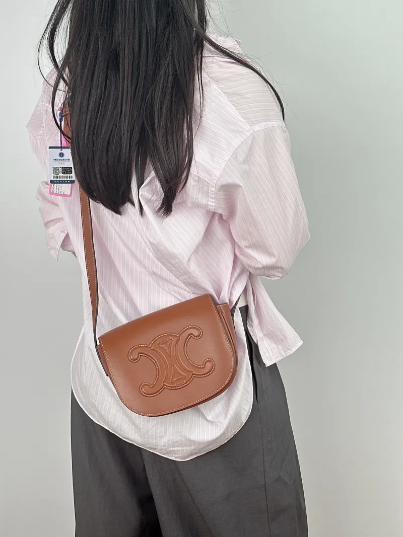 CELINE Crossbody Bag FOLCO TRIOMPHE Caramel Calfskin One Size 18.5 × 7 × 15 cm — on-model view 1 of 2