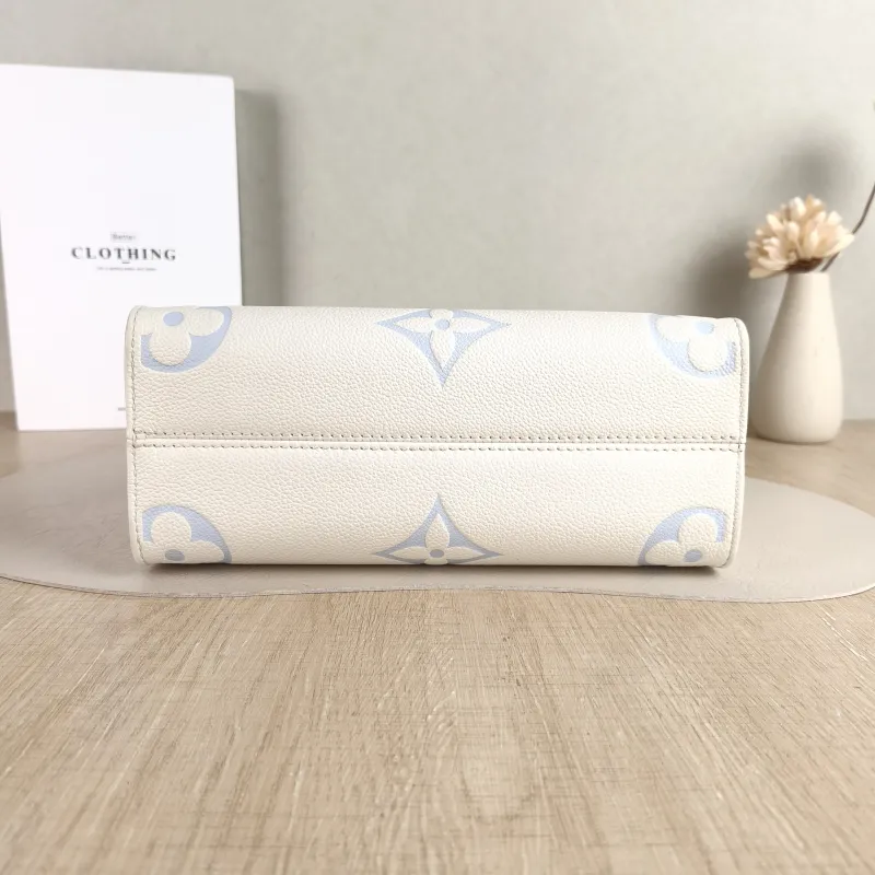 Louis Vuitton Shoulder Bag Onthego White · Blue Monogram Empreinte Embossed Calfskin Small 25 × 11.5 × 19 cm — cover view 3 of 5