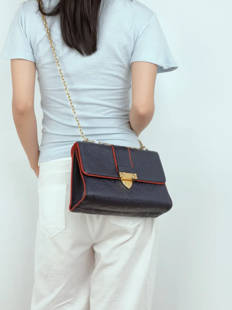 Louis Vuitton Crossbody Bag SAINT SULPICE · Calfskin Small25 × 9 × 17 cm — on-model view 2 of 3