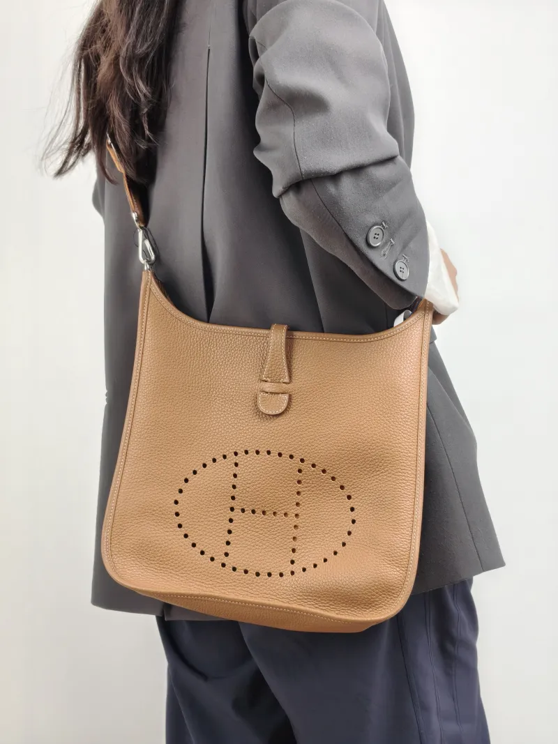 Hermès Crossbody Bag Evelyne 29 29 37 Brown TC Calfskin 29 29 × 7 × 30 cm W — on-model view 1 of 2