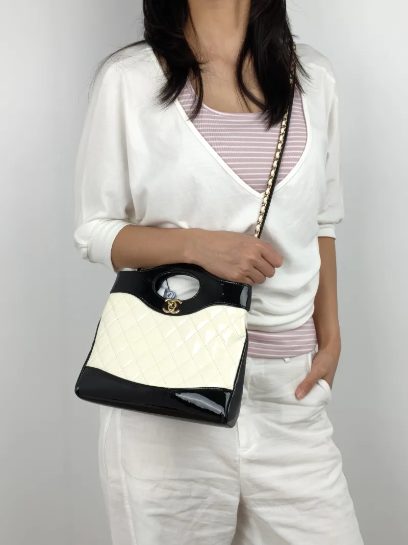 Chanel Crossbody Bag 31Bag Patent Leather Mini 23 × 5.5 × 22 cm — on-model view 2 of 3