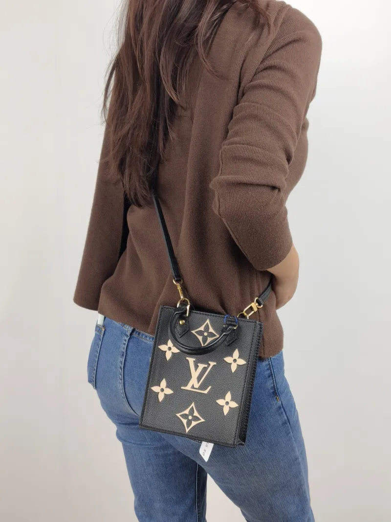 Louis Vuitton Crossbody Bag PETIT SAC PLAT Mini Calfskin Mini 14 × 5 × 17 cm — on-model view 1 of 2