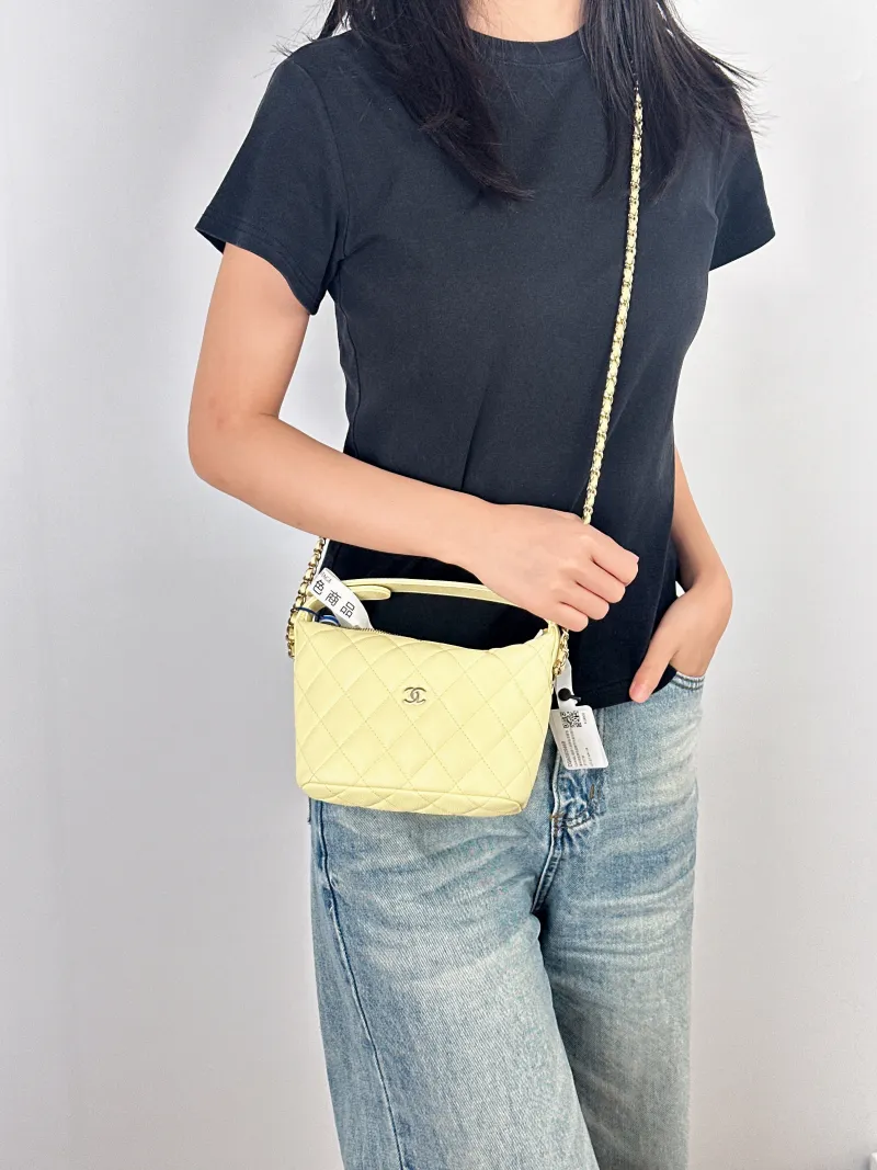 Chanel Crossbody Bag Crossbody Bag Yellow Grained Calfskin One Size21.5 × 7.5 × 19 cm — on-model view 2 of 3