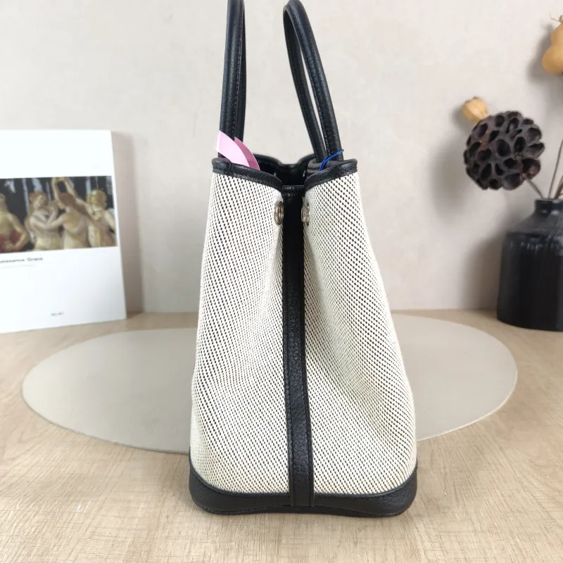 Hermès Top Handle Bag Garden Party 30 30 Beige · Black Canvas · Negonda Calfskin Medium 30 × 13 × 21 cm B — detail view 10 of 10