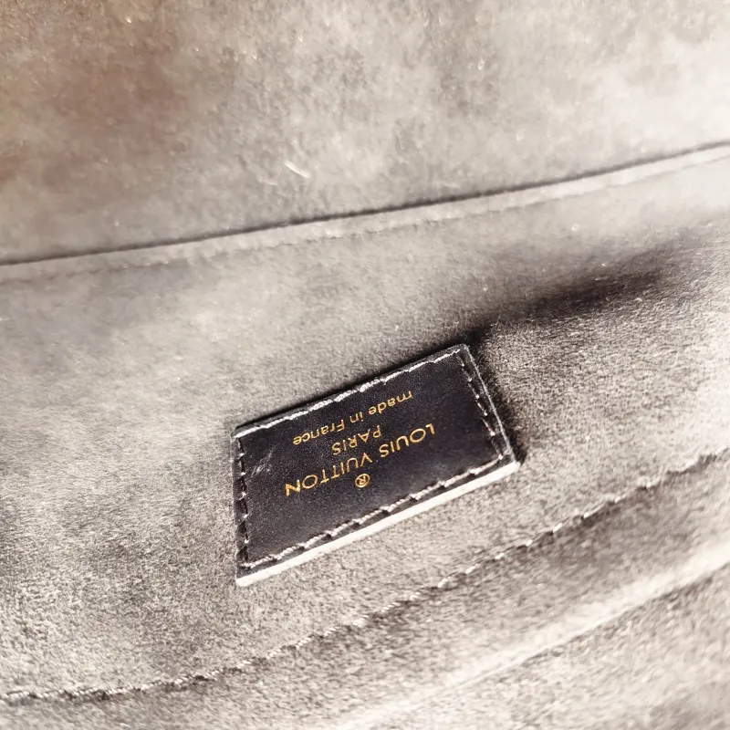 Louis Vuitton Crossbody Bag Onthego East West Two Straps Black Monogram Empreinte Embossed Calfskin Small 25 × 10 × 13 cm — detail view 8 of 11