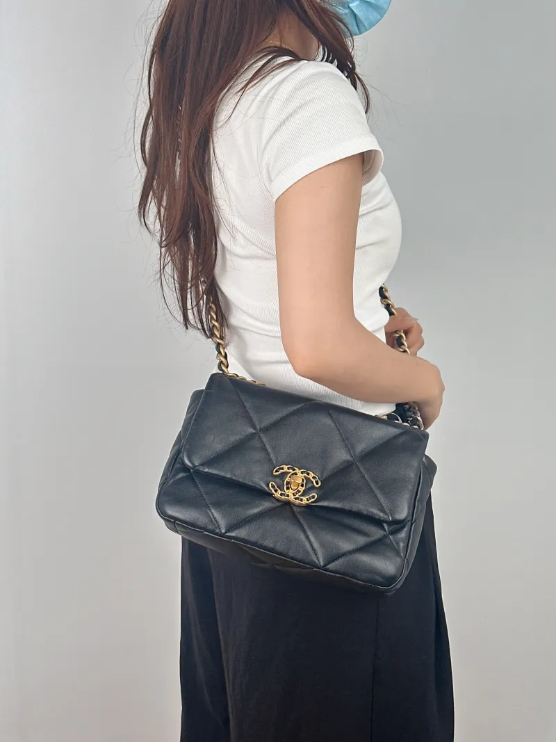 Chanel Crossbody Bag 19Bag Black SL ambskin Small 26 × 9 × 16 cm — on-model view 1 of 2