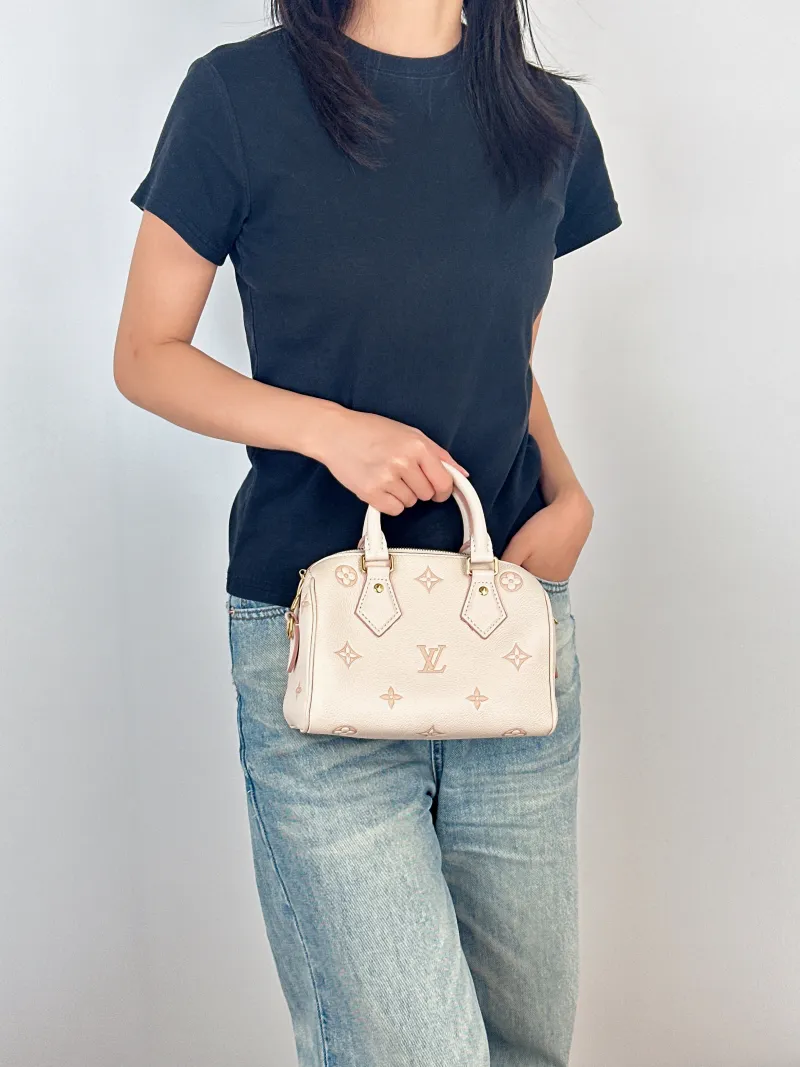 Louis Vuitton Crossbody Bag Speedy20Beige · Pink Empreinte Embossed Calfskin Small20.5 × 12 × 13.5 cm — on-model view 1 of 3
